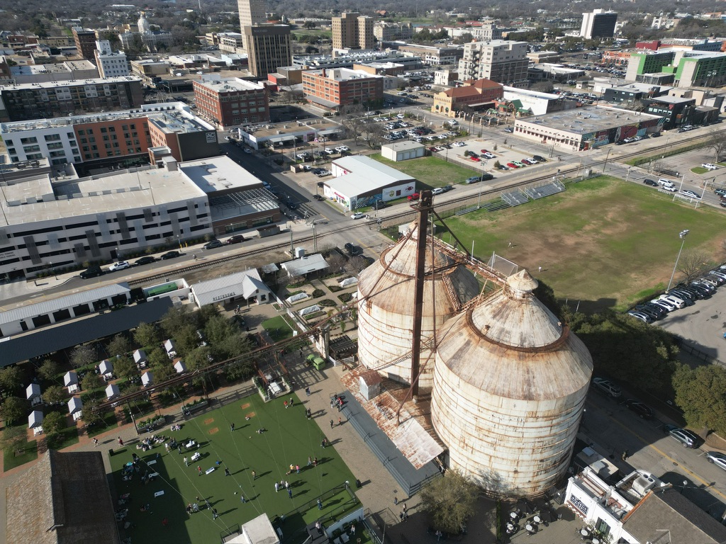 Aerial drone view of Magnolia Market grain silos in Waco Texas